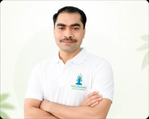 Professional male yoga instructor at home for therapeutic pain relief